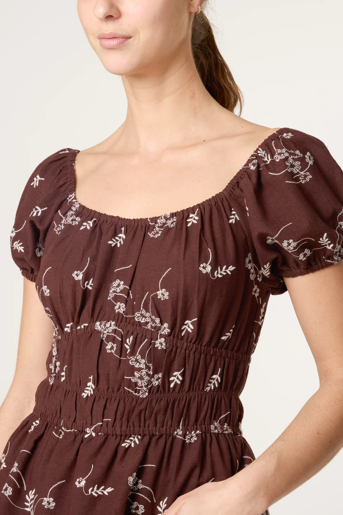 Brown shirred peplum